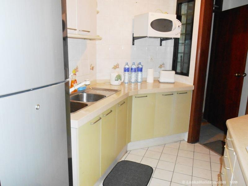 Spacious kitchen with laundry room